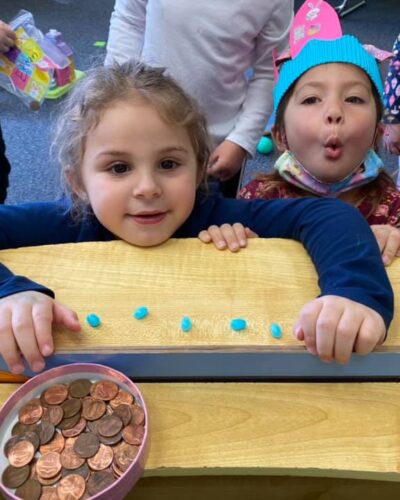 Preschooler learning about money